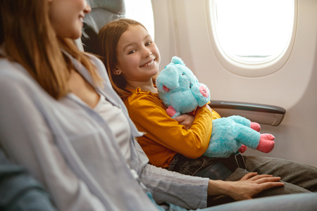 joyful-little-girl-and-woman-sitting-in-passenger-2022-03-31-23-47-34-utc-1.jpg