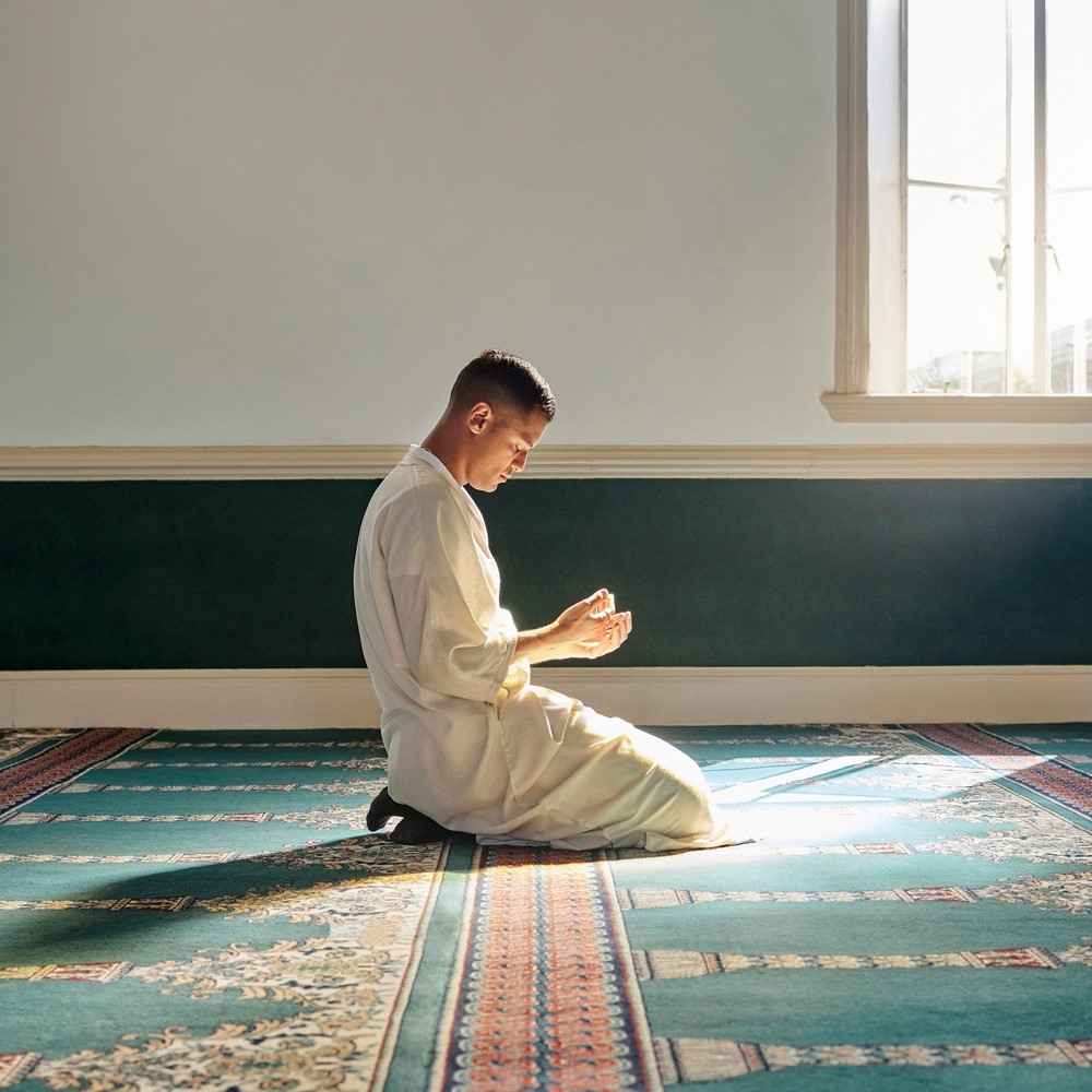 Muslim pray, hope or hands in prayer on carpet for peace, Ramadan concept.